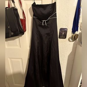 A long black dress with a bow. Great for formal occasions.